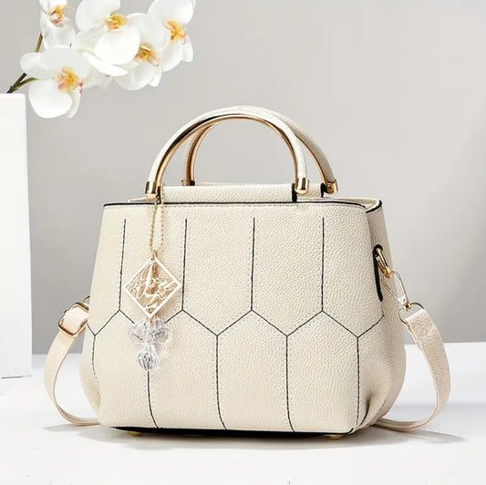 Sac bandoulière élégant avec poignée dorée & pendentif